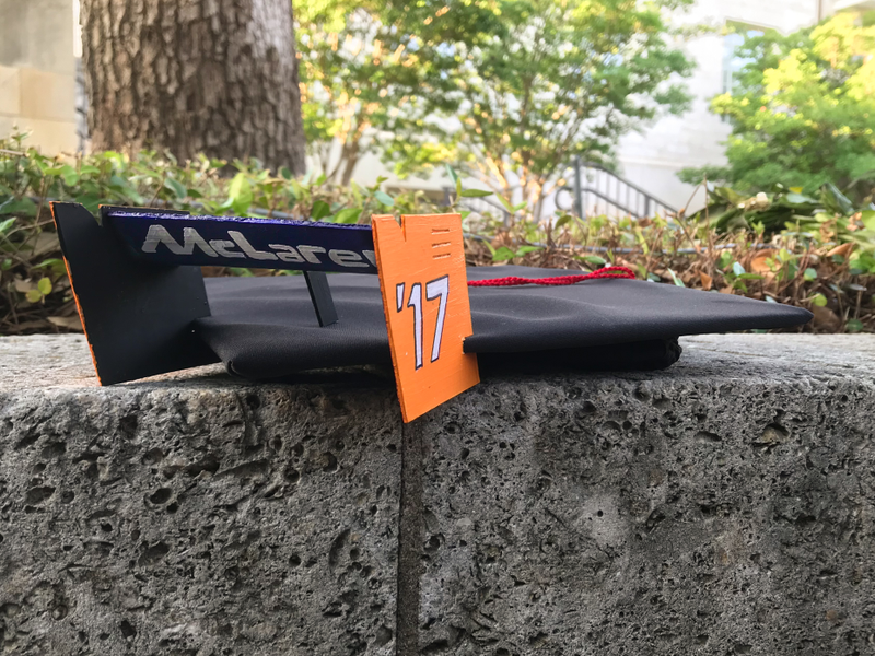 Illustration for article titled These Two Graduates Turned Their Grad Caps Into Formula One Wings